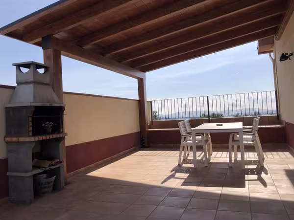 Porxos de fusta amb barbacoa